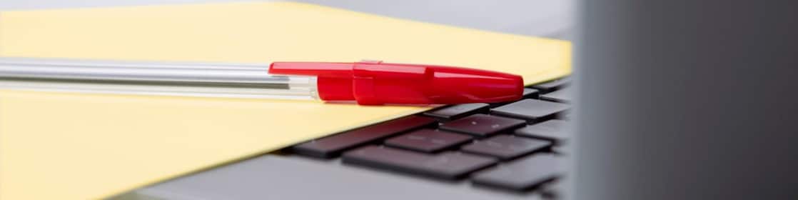 photo-of-red-pan-on-yellow-piece-of-paper